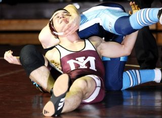 Chad Coleman/Mercer Island Reporter Jackson Fischer survived having his neck stretched out during a match against Interlake. The Islander won on points