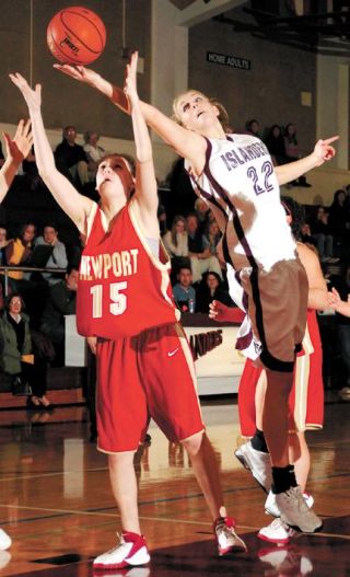 Chad Coleman/Mercer Island Reporter Islander Georgia Gier scored 11 points and 10 rebounds during the first quarter of her team’s game against Newport.