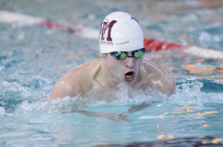 Islander tsunami sweeps 3A KingCo boys swim