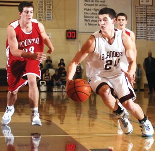 Islanders Leroy Lutu (24) drives past the Mount Si defense at Mercer Island last Tuesday