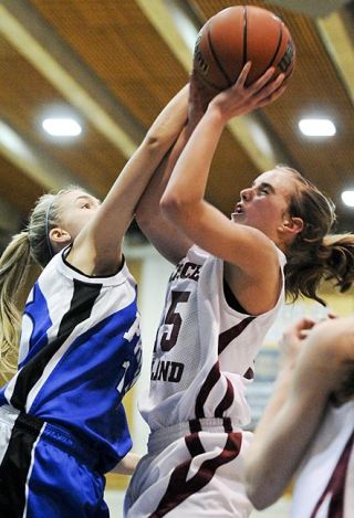 Chad Coleman/Mercer Island Reporter Islander Hailey Gullstad attempts a shot against Seattle Prep on Thursday at Bellevue Community College.