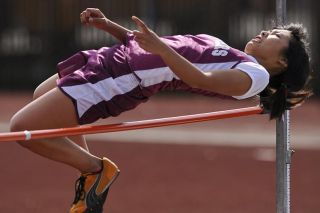 Chad Coleman/Mercer Island Reporter Islander Becky Yoda competes in the high jump during a meet against Mount Si at Islander Stadium. Both the boys (78-64) and the girls (83-67) lost to the Wildcats on Thursday.