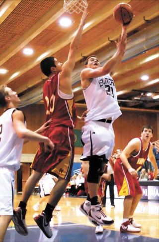 Chad Coleman/Mercer Island Reporter Islander Leroy Lutu scored 10 points during the fourth quarter of Mercer Island’s loss to Newport Friday.