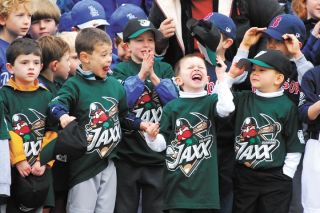 Chad Coleman/Mercer Island Reporter Young ball players enjoy the Opening Day ceremonies for the Island’s Little League at the South Mercer Playfields on Saturday.