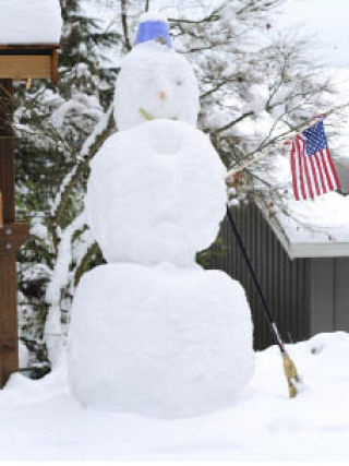 This snowman was last seen standing on Dec. 23 in the 4100 block of West Mercer Way on Mercer Island. Warmer weather came and took “Patriotic Frosty” away. Winter will not officially end until March 19.