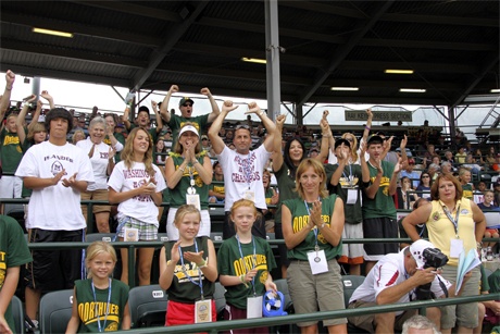 Mercer Island Little League fans react to Sam Pugel’s single in the bottom of the second inning to score Brandon Lawler and take a 2-1 lead over the Southeast team