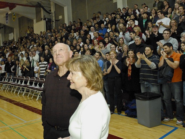 Former Mercer Island High School basketball coach Ed Pepple watches with his wife Shirely