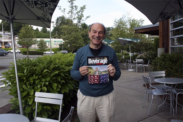 Pat Weinstein of Mercer Island poses with the January issue of Beverage Industry magazine. His company