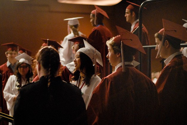 Seniors wait to accept their diplomas during the Mercer Island High School graduation ceremony at the Meydenbauer Center in Bellevue on Thursday.