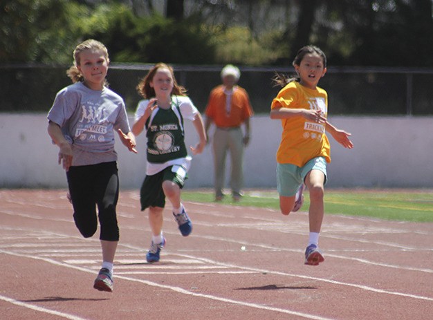 Fourth graders Caley Newcomer (far left)