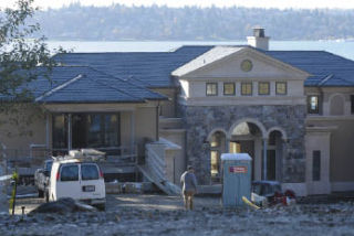 The City of Mercer Island Planning Commission recently upheld a city code that allows an indoor gymnasium to be constructed at this large home near Franklin Landing on Mercer Island