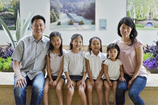Pastor Peter Sung with his daughters