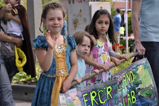 Children with the Mercer Island Learning Lab take part in the annual Summer Celebration parade on Saturday