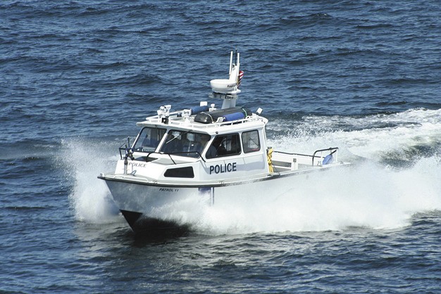 A Mercer Island Police Department marine patrol boat is busy during the 2012 Seafair weekend.