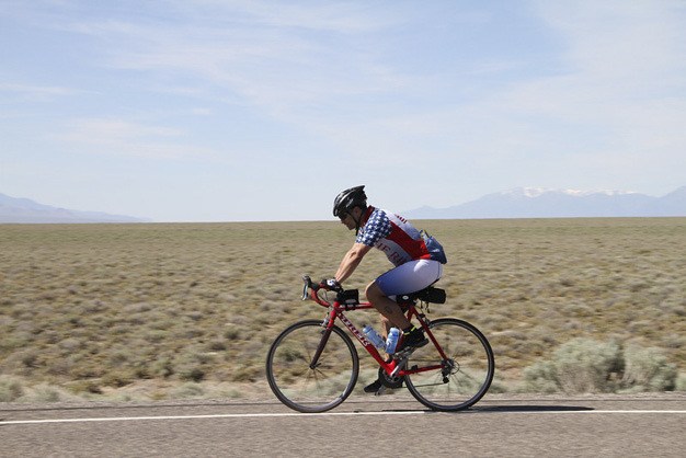 Kevin Mincio rides across Nevada during his cross country trip to raise money for veteran families. Mincio is the Mercer Island boys’ lacrosse coach. ‘The Long Ride Home’ will premiere at the Seattle International Film Festival next week.