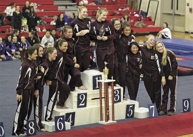 The Mercer Island girls gymnastics team won the SeaKing district title on Saturday night. The Islanders will be one of eight teams competing at the state tournament this weekend.