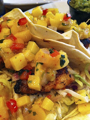 Chile lime fish or shrimp tacos are a great summer favorite.