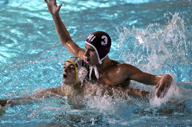 Mercer Island's Trevor Gullstad gets to work on the defensive end against Shorewood Oct. 14. The Islanders beat the Thunderbirds 19-12.