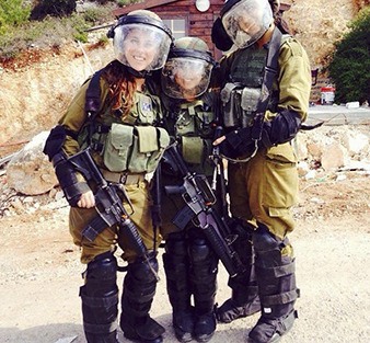 As part of the search and rescue combat team Mogil (far left) was called on to control big riots