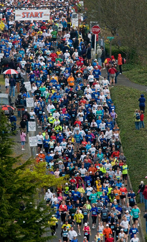 Runners start the Mercer Island Rotary Half Marathon on Sunday morning.