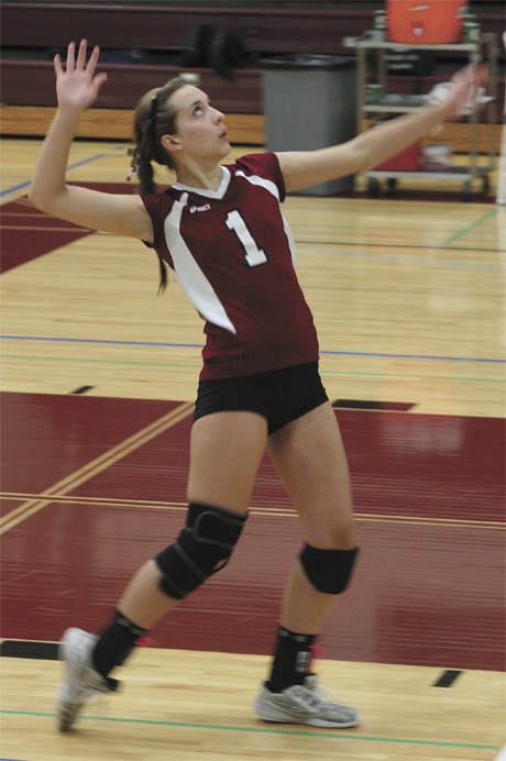 Ariel Dewey prepares to serve during the Islanders non-conference match up against Newport last week. The MIHS team lost 3-1 to the 4A rivals.