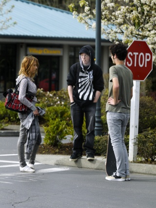 Youth congregate on a corner in the South-end shopping center on Mercer Island