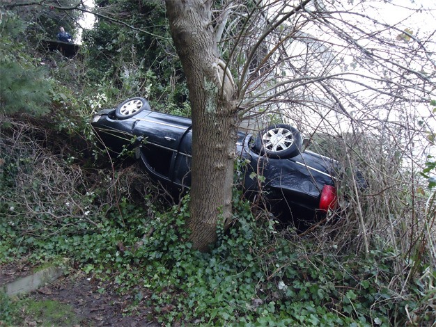 A Metropolitan Town Car limousine rolled over in the 7700 block of West Mercer Way on Sunday