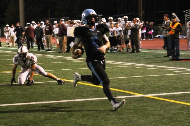 Interlake quarterback Duncan Varela converts on one of his three 2-point conversions against Mercer Island Friday