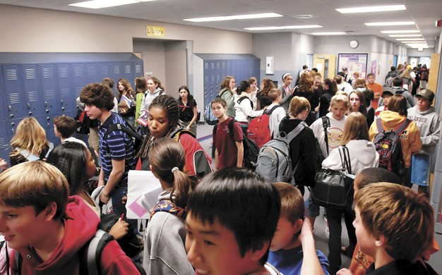Students fill the hallway of Islander Middle School