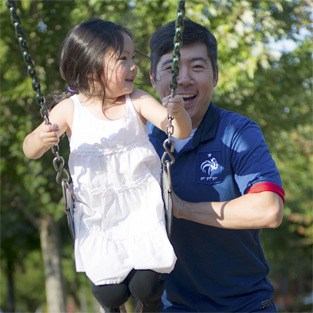 A dad and his daughter enjoy some time at the swings in Mercerdale Park on Sunday