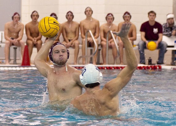 Mercer Island’s Sam Peterson looks for an open teammate during the Islanders’ state semifinal game against Curtis.