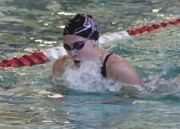 Emily Koksu swims during the girls 200 individual medley race during the KingCo conference meet on Saturday