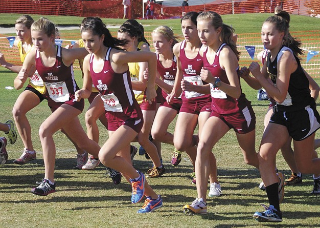 The Mercer Island girls cross country team takes off at the start of the 3A state meet last weekend in Pasco. The team finished seventh overall.