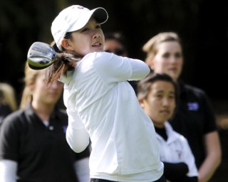 Islander Hailey Chinn tees off on the first hole against Lake Washington at Bellevue Municipal Golf Course on April 9.