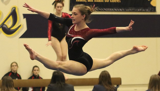 Mercer Island's Madeline Gile performs her floor routine during the 2A/3A KingCo gymnastics championships Saturday
