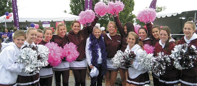 Members of the Mercer Island High School cheerleading squad joined Cookie Laughlin (center) at the Walk of Hope last week. The Walk of Hope raises awarness and funds for women’s cancer. The MIHS cheerleaders came out to support Laughlin and their fellow students at the walk at Magnuson Park.
