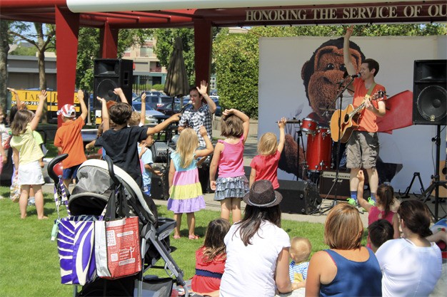 The Recess Monkey band entertains children in Mercerdale Park on Friday