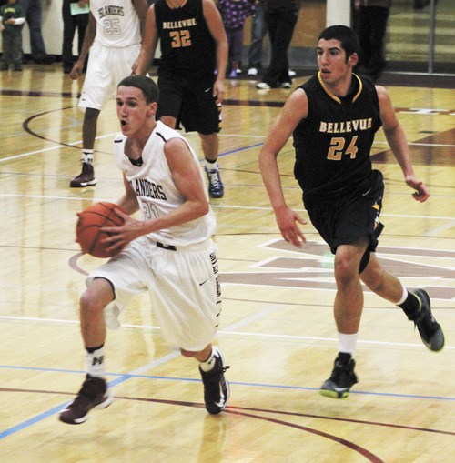 Mercer Island senior Jake Shaddle heads to the basket during the Islanders’ home win over Bellevue on Friday