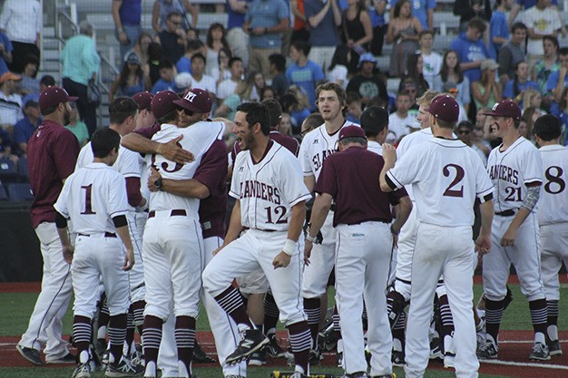 Mercer Island celebrates after Josh Stenberg's walk-off home run earned the Islanders their first 3A state baseball championship Saturday
