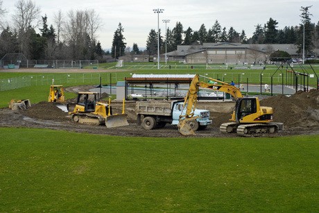 Construction of new ballfields at the South Mercer Playfields continues behind Islander Middle School