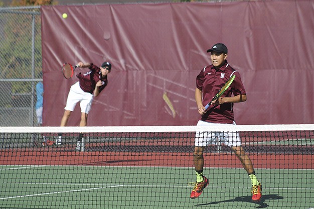 Mercer Island's Ben Bethards (left) and Jarod Wong compete in the 3A KingCo boys tennis tournament Tuesday