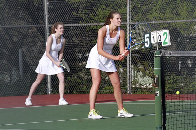 Mercer Island's Kristine Melin and Julia Glick compete in doubles action against Garfield Wednesday
