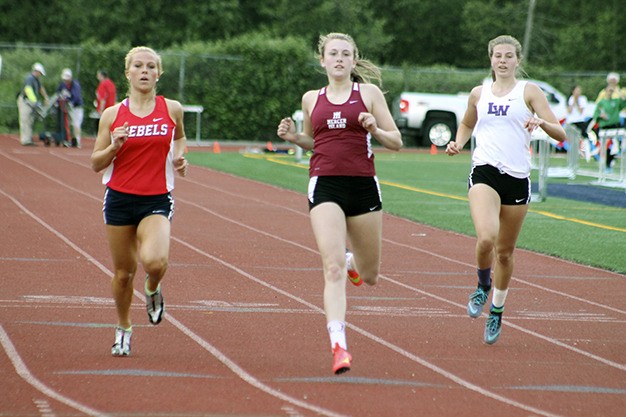 Mercer Island's Victoria Gersch (center) won the 100 and 200 meter races at the KingCo track and field championships Friday