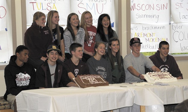 Twelve of the 14 seniors at Mercer Island High School who signed early letters of intent to play athletics in college next year enjoyed a reception at the school in mid-November.