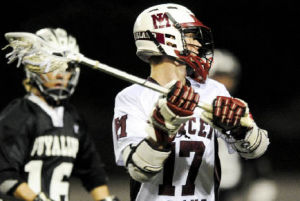 Islander Steven Taylor controls the offense and the flow of the game against Puyallup prior to scoring one of his two goals.