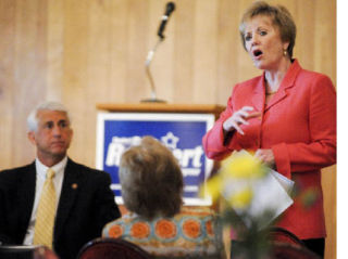 Rep. Kay Granger of Texas speaks to Women of Washington while Rep. Dave Riechert