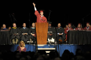 Class speaker John O’Meara calls for applause during the graduation ceremony.