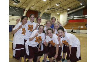 The Mercer Island High School girls varsity basketball team includes — back row: Kelly Han