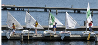 Kids’ sailing camp participants rig their sails for the afternoon water session at Luther Burbank Park