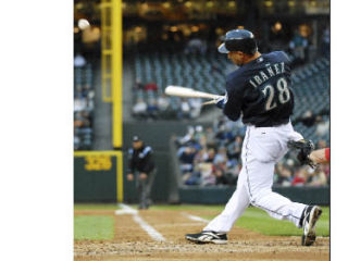 Seattle Mariners left fielder Raul Ibanez breaks his bat on a swing during a game against the Los Angeles Angels.